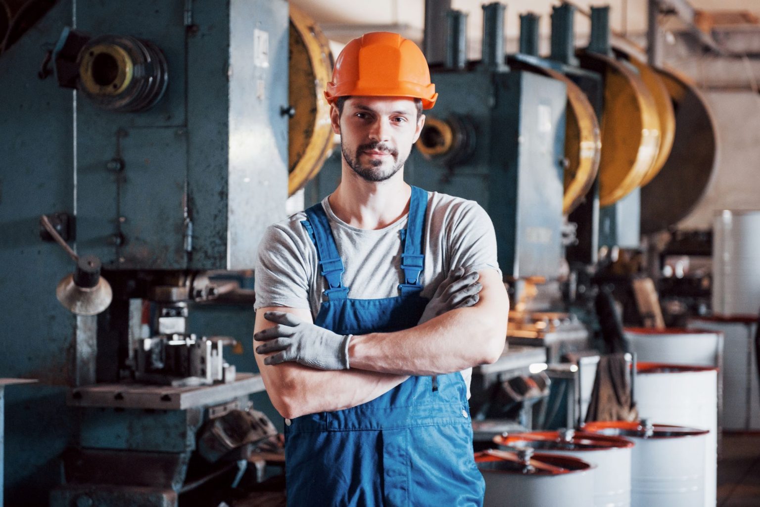 portrait-young-worker-hard-hat-large-metalworking-plant